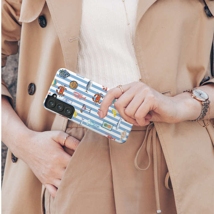 Samsung Galaxy phone case with blue and white stripes and colorful seafood, lemon, crab, and cocktail illustrations – coastal aesthetic tough case