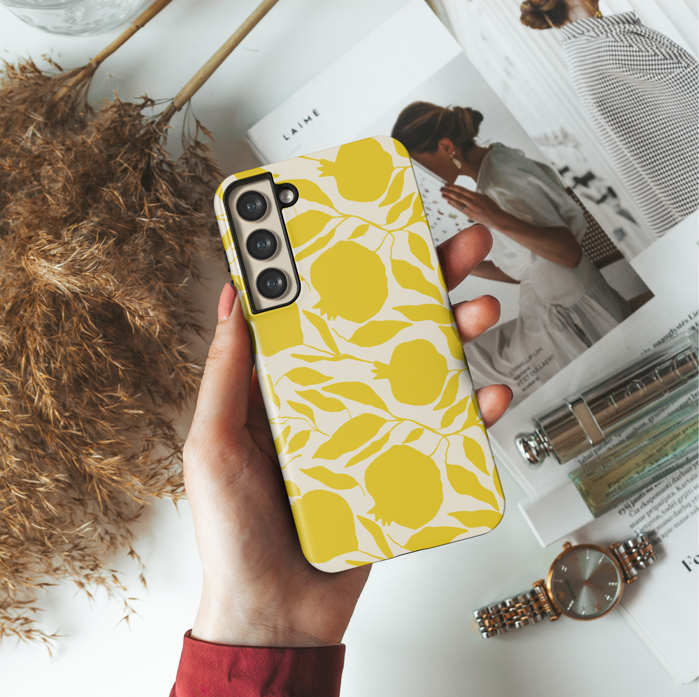 Samsung Galaxy phone case with modern yellow fruit and leaf silhouettes on a cream background – aesthetic citrus-themed design