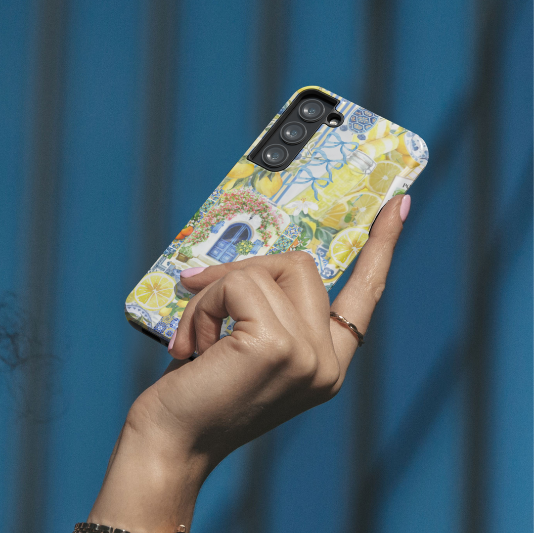 Mediterranean lemon garden iPhone case with blue tiles, florals, citrus fruits, and a coastal villa door – designed for Galaxy S25 Ultra, S24, S23, S22