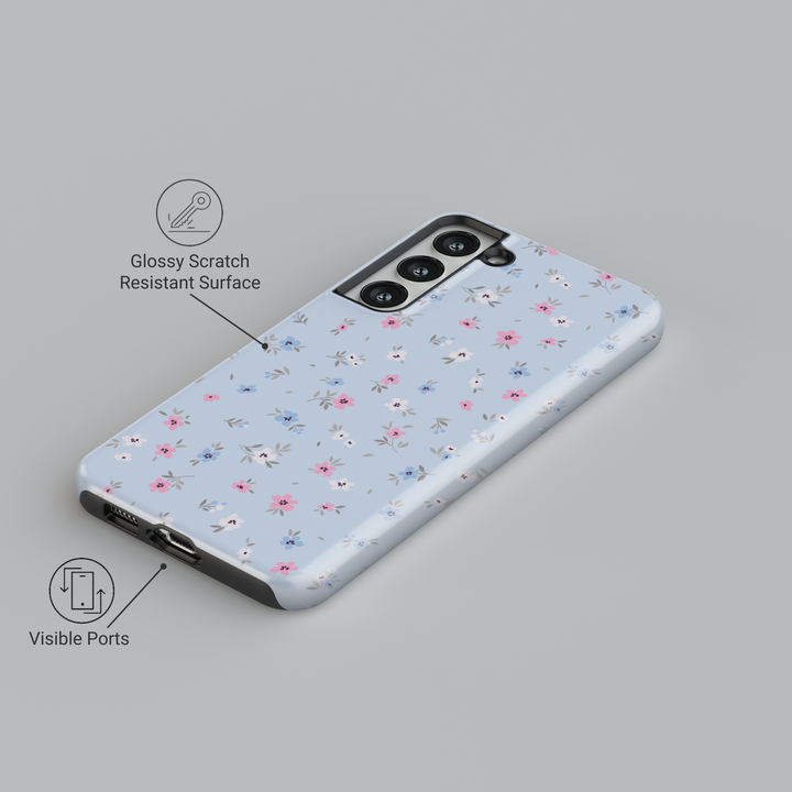 Pastel blue floral Galaxy case with small pink, blue, and white flowers – cute spring phone cover for women