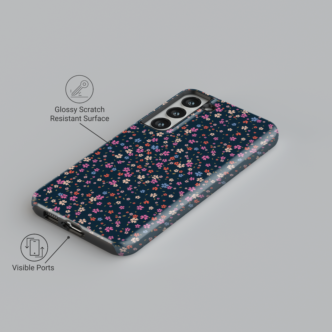 Galaxy phone case with tiny multicolored floral print on dark navy background – aesthetic garden-style design