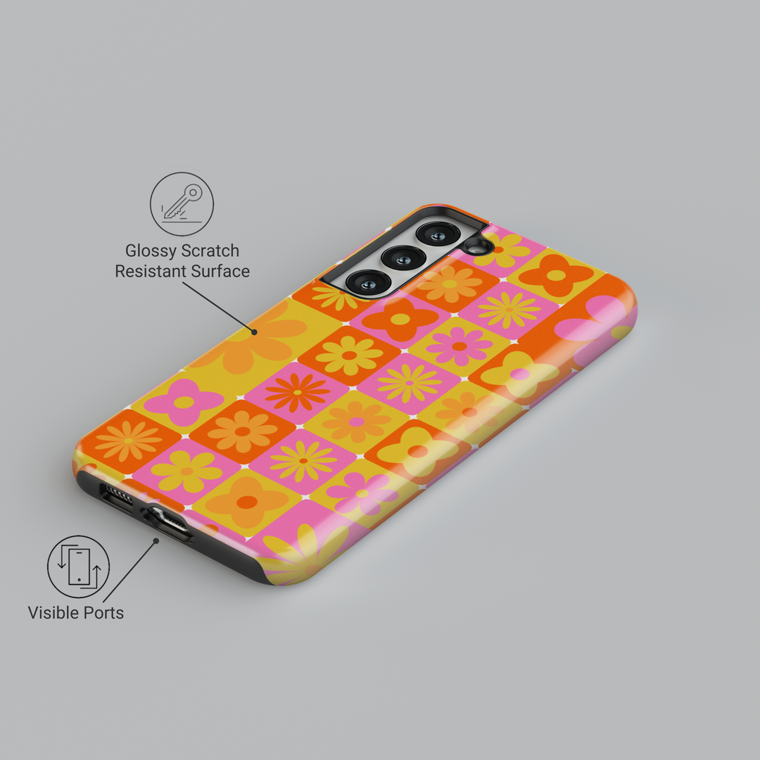 Samsung Galaxy case with retro 70s-inspired flower tile pattern in orange, pink, and yellow – fits Galaxy S24 Ultra, S25, and S24 FE. Bright vintage floral phone case for women.