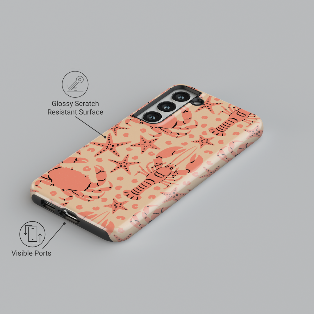 Samsung Galaxy case with coral lobster, crab, and starfish pattern on beige background – beach-themed design for Galaxy S24 Ultra, S25, and S24 FE.