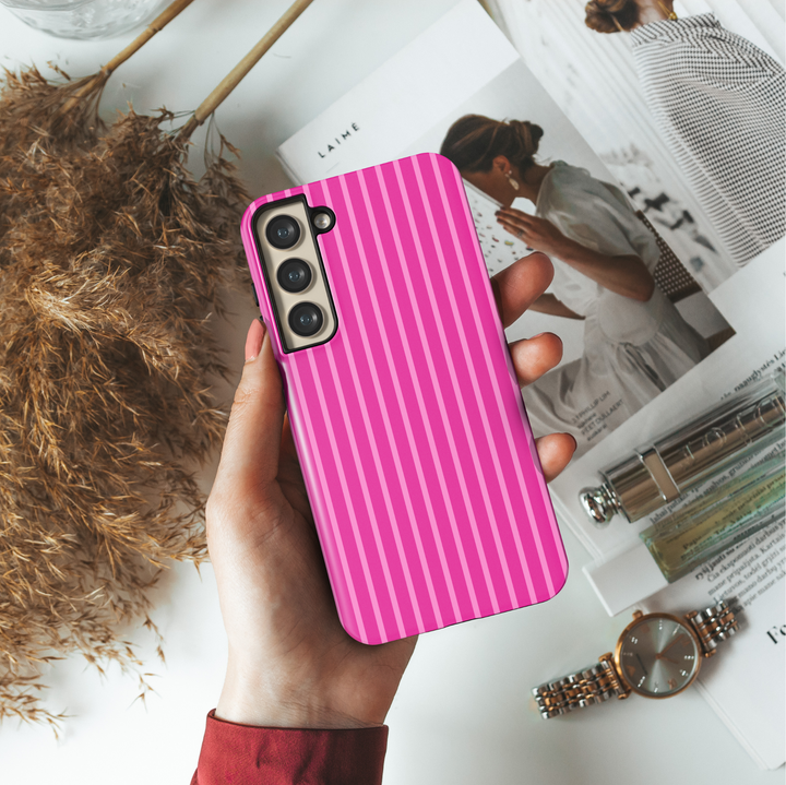 Hot pink Samsung Galaxy phone case with bold vertical magenta and fuchsia stripes – tough girly protective cover for Galaxy S24 Ultra and more