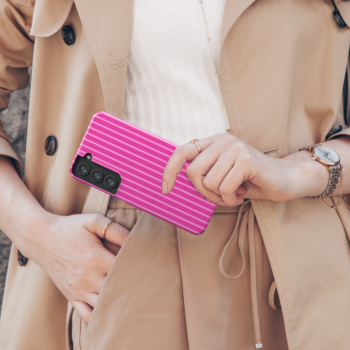 Hot pink Samsung Galaxy phone case with bold vertical magenta and fuchsia stripes – tough girly protective cover for Galaxy S24 Ultra and more