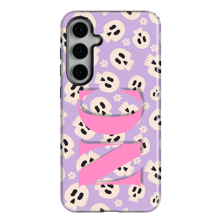 Samsung Galaxy S25 Ultra and S24 FE case with pastel purple background, cream skull and flower pattern, and large pink custom monogram.
