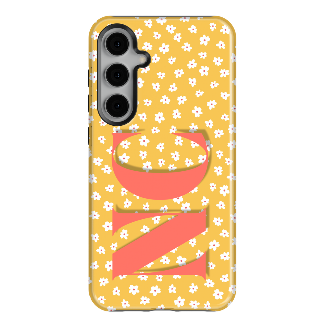 Samsung Galaxy S25 Ultra and S24 FE case with yellow background, white daisy floral pattern, and large coral monogram.