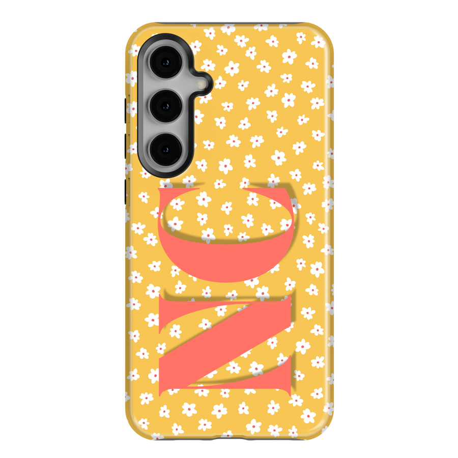 Samsung Galaxy S25 Ultra and S24 FE case with yellow background, white daisy floral pattern, and large coral monogram.