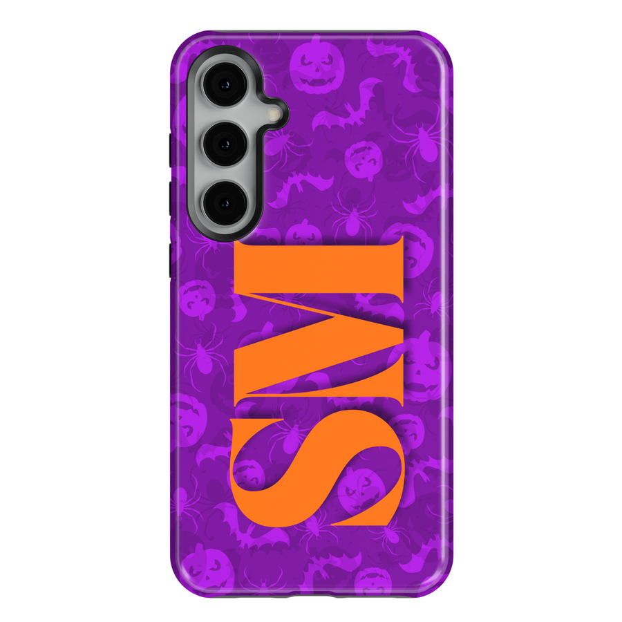 Samsung Galaxy S25 Ultra and S24 FE Halloween phone case with purple spooky background pattern of bats, pumpkins, and spiders, featuring bold orange monogram.