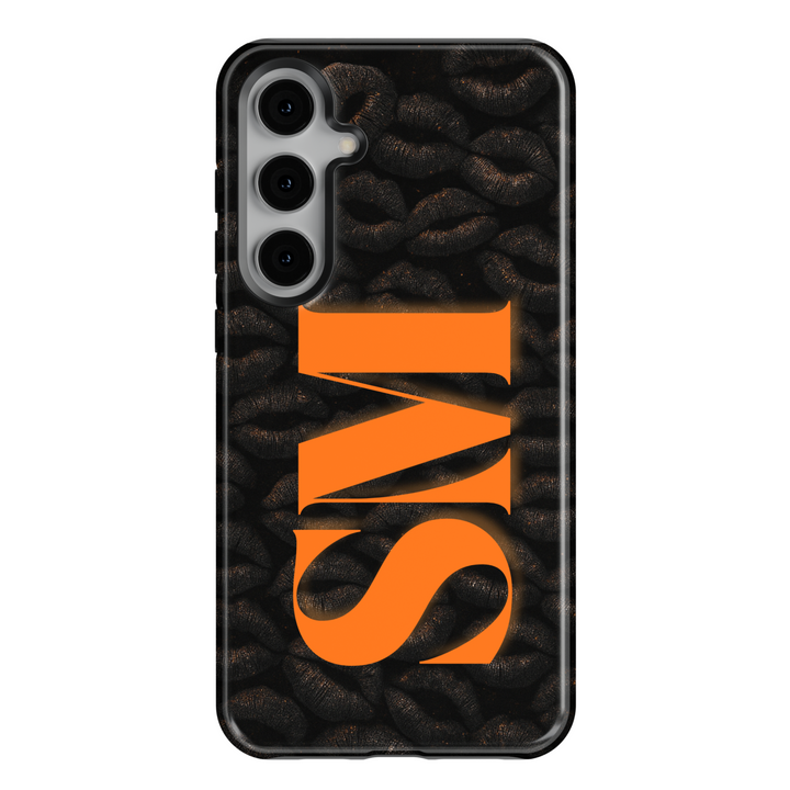 Samsung Galaxy S25 Ultra and S24 FE phone case with bright orange background and black lipstick kiss print pattern.