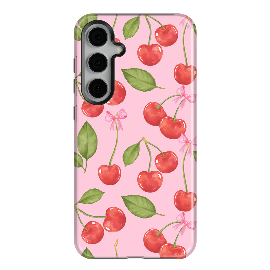 Cute Samsung Galaxy case with pink background, red cherry and white polka dot pattern – fits Galaxy S24 Ultra, S25, S24 FE. Girly cherry design with leaves and bow accents.