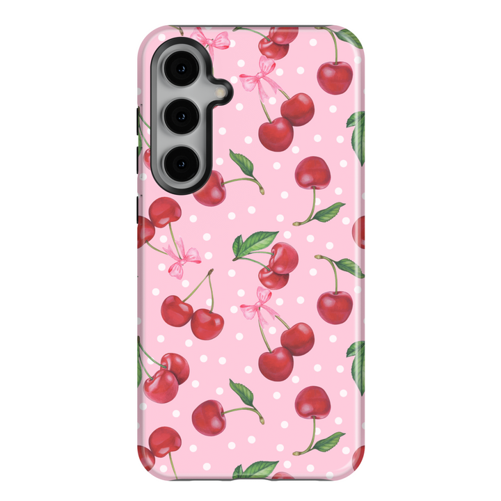 Cute Samsung Galaxy case with pink background, red cherry and white polka dot pattern – fits Galaxy S24 Ultra, S25, S24 FE. Girly cherry design with leaves and bow accents.