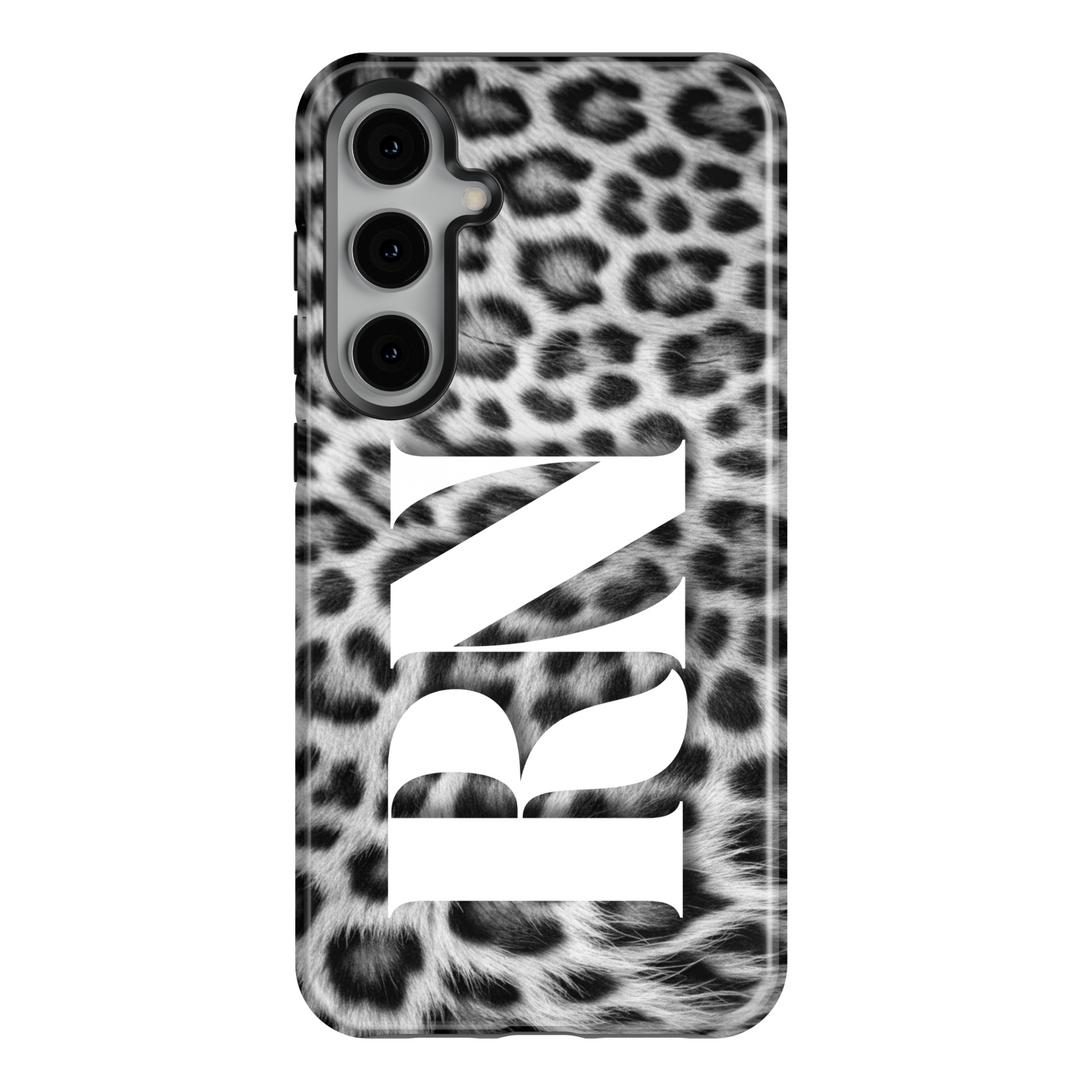 Samsung Galaxy S25 Ultra and S24FE tough phone case for women with black and white snow leopard print and white monogram – fashionable and protective.