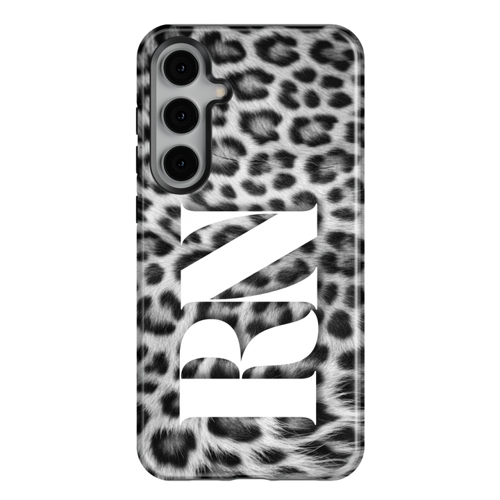 Samsung Galaxy S25 Ultra and S24FE tough phone case for women with black and white snow leopard print and white monogram – fashionable and protective.