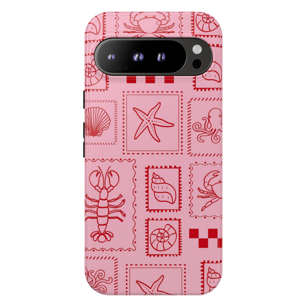Pink Google Pixel case with red sea creature stamps including lobster, shell, starfish, crab, and octopus in a playful coastal grid pattern