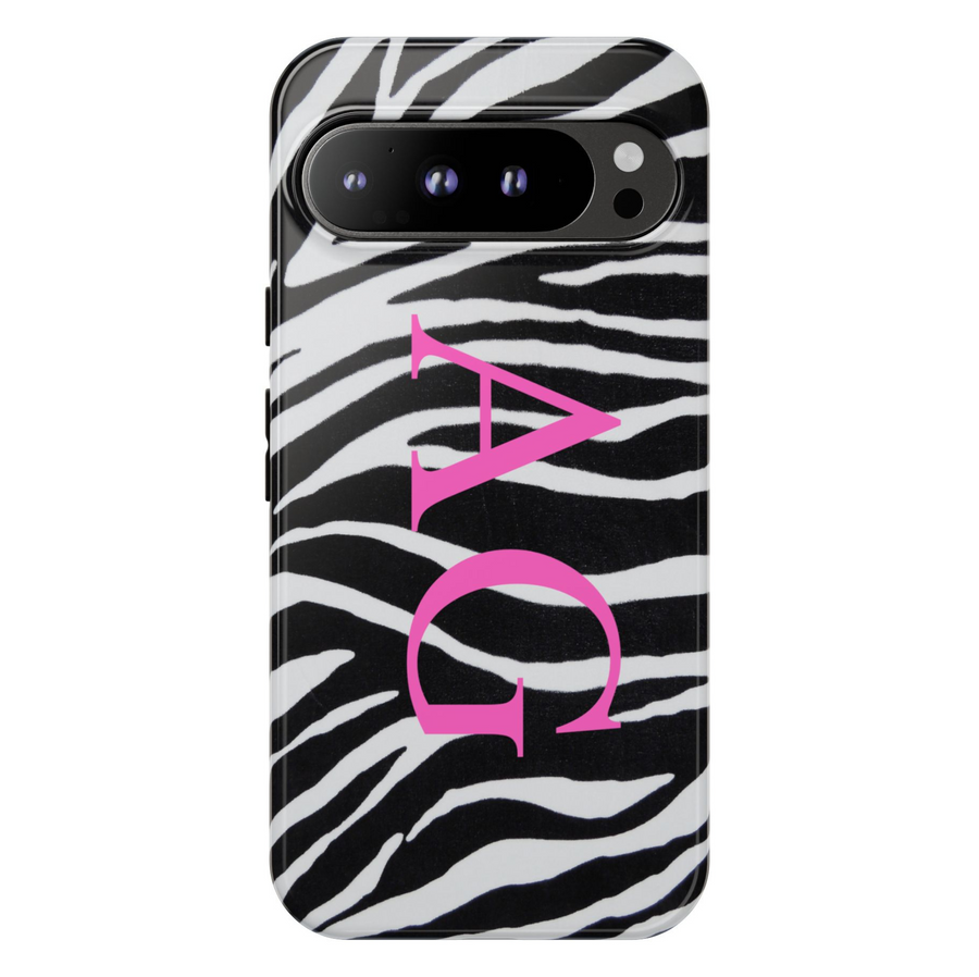 Google Pixel case with black and white zebra pattern and bold pink monogram initials "AG" in vertical layout