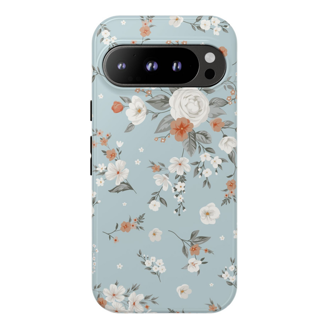 Elegant tough Google Pixel case with soft blue background and white, orange, and blush floral design – fits Pixel 8, Pixel 8 Pro, Pixel 9 Pro XL