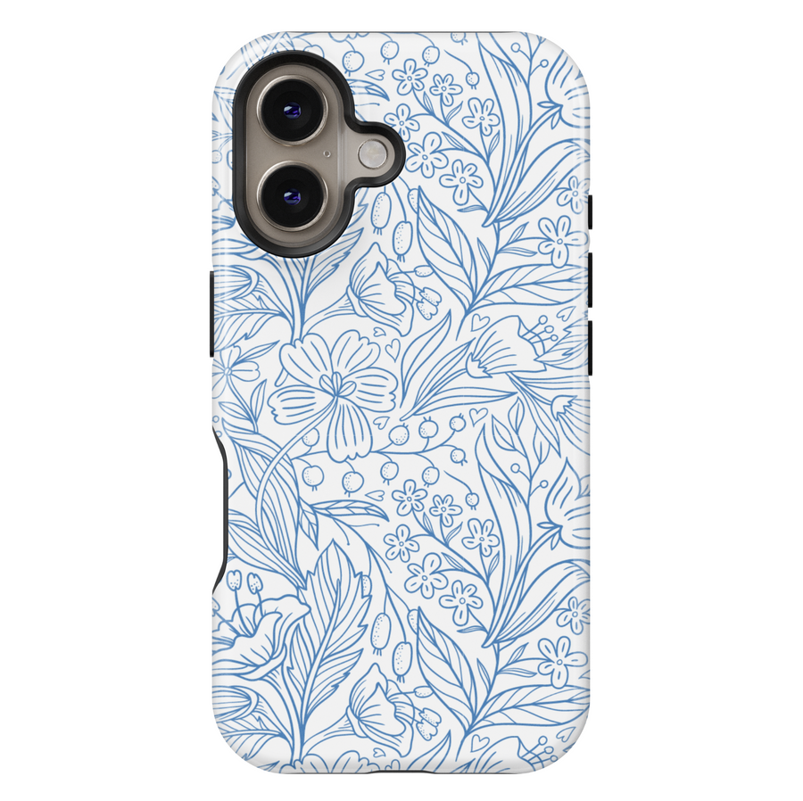 White iPhone case featuring a detailed blue floral line art pattern with various wildflowers, leaves, and berries, creating a clean and elegant botanical look.