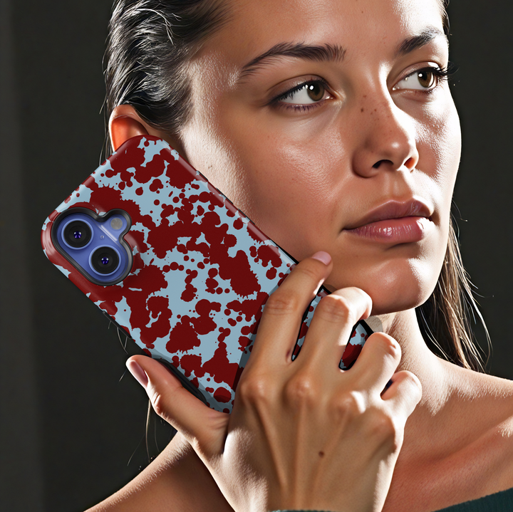 Abstract red paint splatter iPhone case on light blue background – Tough protective phone cover for iPhone 15, 14, 13, 12, 11 models