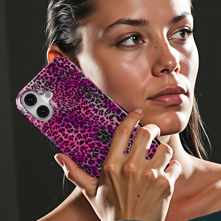 Hot pink leopard print phone case with purple and black animal spots, trendy chic aesthetic protective cover for iPhone and Samsung
