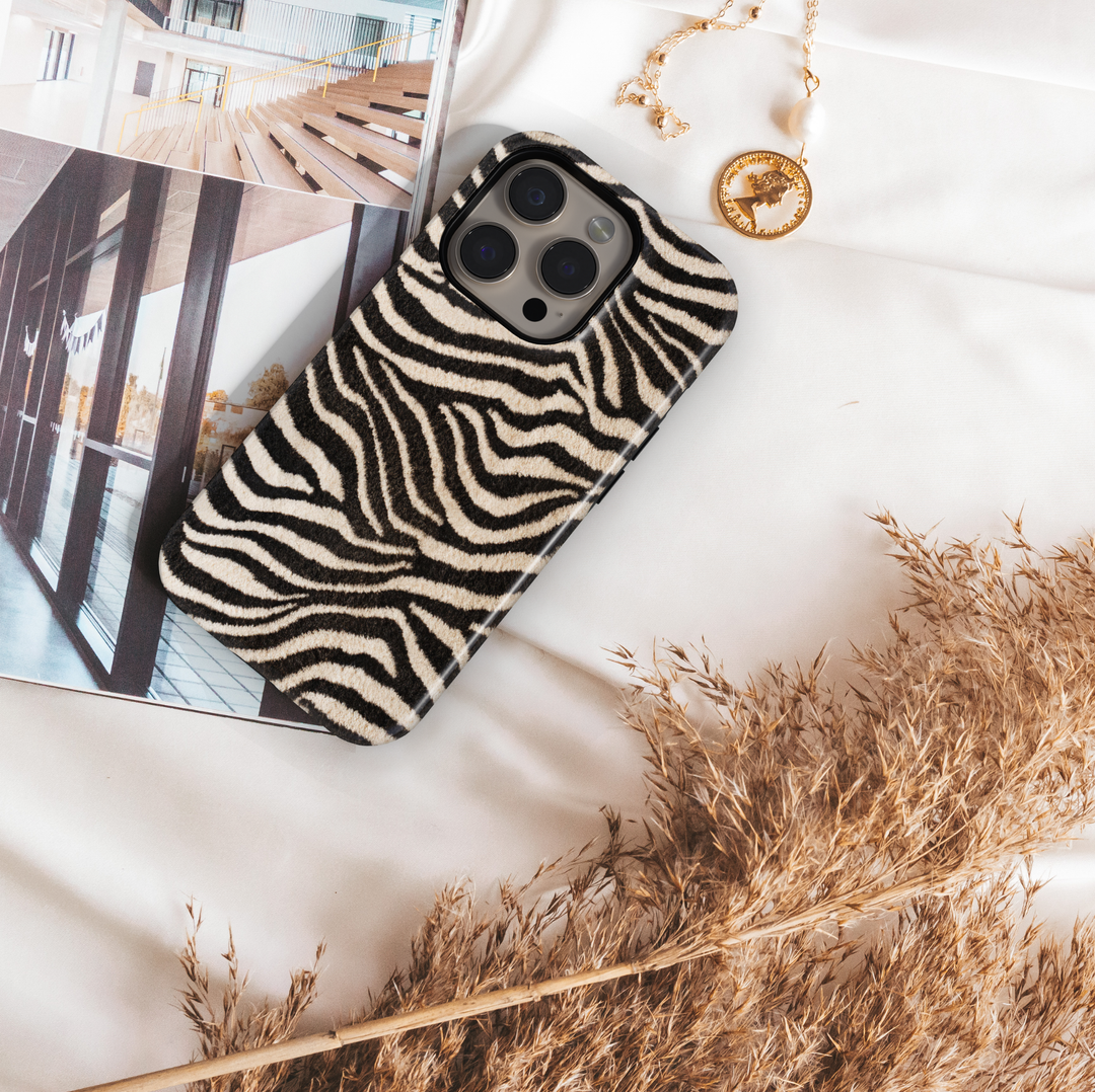 Tiger stripe phone case with orange and black fur pattern, realistic animal print protective cover for iPhone and Samsung