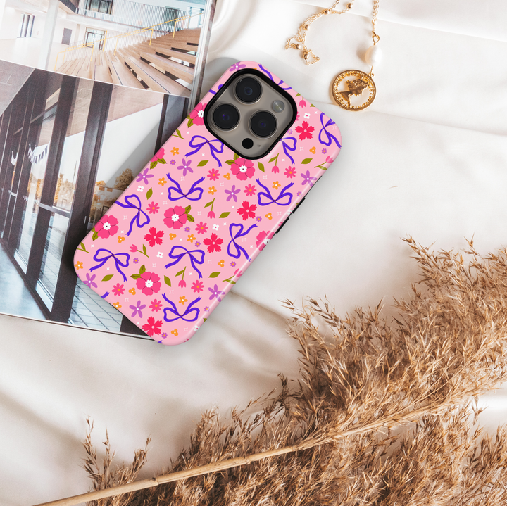 Pink phone case with purple bows and floral design, coquette girly aesthetic phone cover for iPhone and Samsung