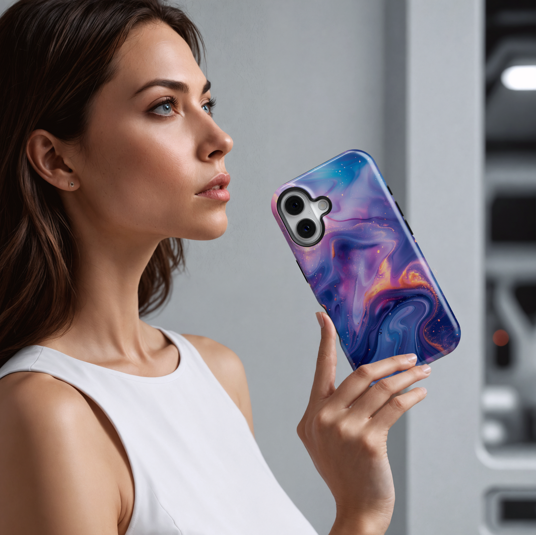 Abstract galaxy swirl iPhone 16 MagSafe case in dreamy purple, blue, and gold tones – aesthetic, protective, and perfect for a cosmic look.