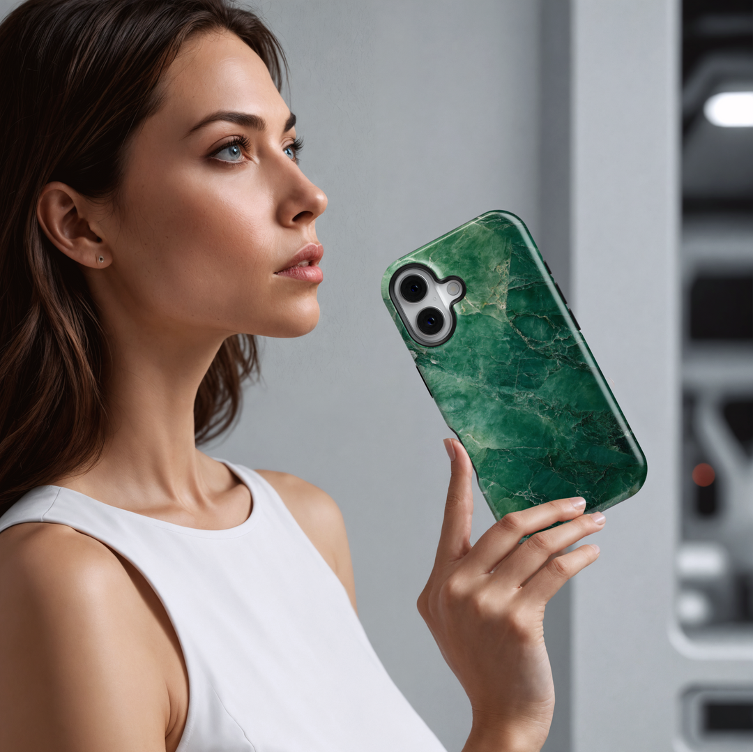 Emerald green marble iPhone 16 MagSafe case with natural stone texture and deep jade tones, elegant and protective phone cover.