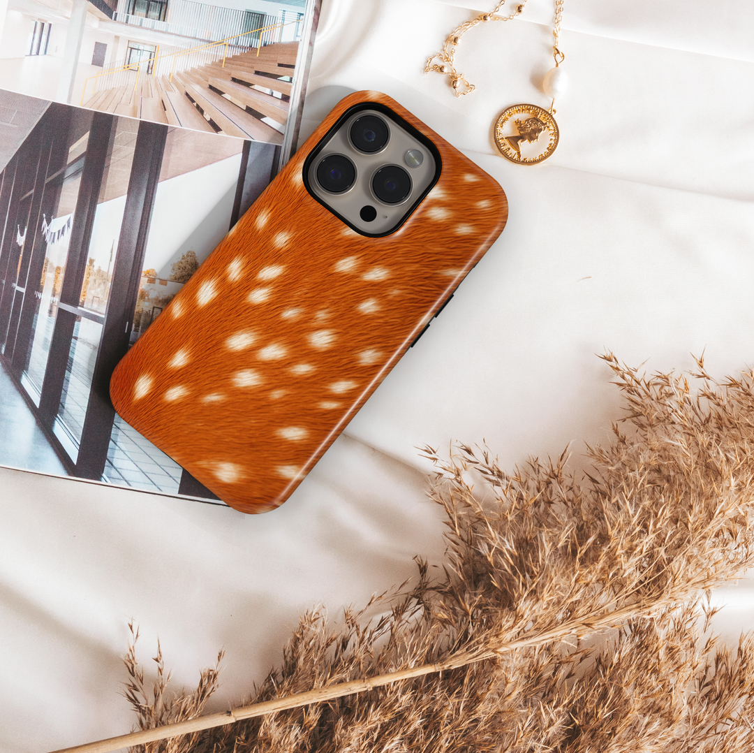 Deer fur print phone case with brown and white spotted pattern, cozy aesthetic animal print protective cover for iPhone and Samsung