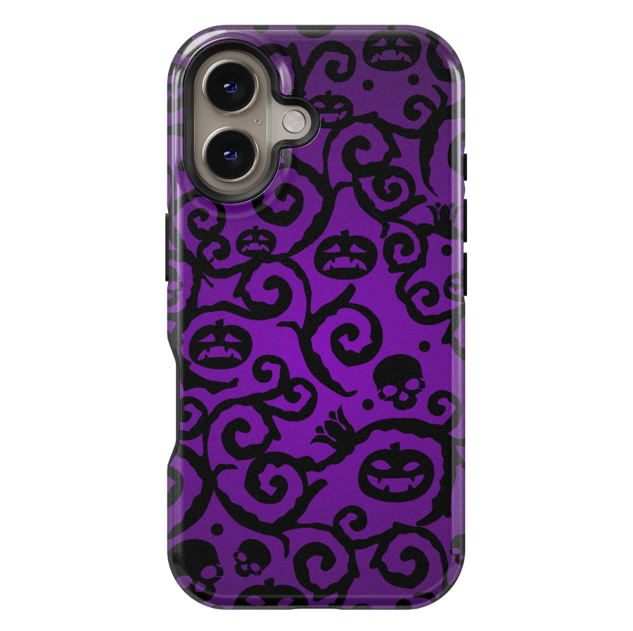 Purple iPhone case with swirling black Halloween vines, spooky jack-o'-lantern faces, skulls, and dark gothic pattern. Perfect for Halloween season aesthetic