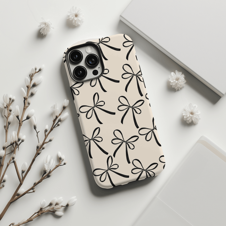 Discover our Coquette Phone Case collection, featuring MagSafe compatibility and trendy designs like seashells, bows, and strawberry prints. Perfect for iPhone 16, 15, 14, 13, 12, and 11 models, including Pro Max, these cases offer a coquette aesthetic with pink petals, pastel blooms, and blush flowers. Whether you’re looking for a gift for a teen or a stylish, girly phone case, our selection of floral charms, coquette blossoms, and pink garden patterns will add a touch of elegance to your device. Protect y
