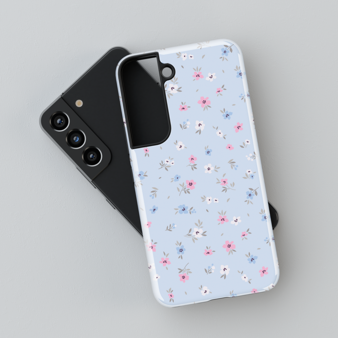 Pastel blue floral Galaxy case with small pink, blue, and white flowers – cute spring phone cover for women
