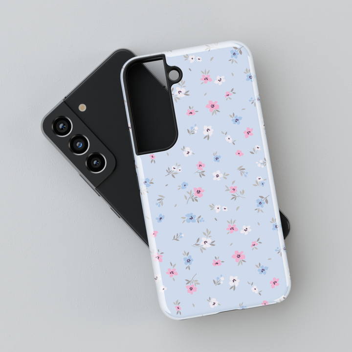 Pastel blue floral Galaxy case with small pink, blue, and white flowers – cute spring phone cover for women