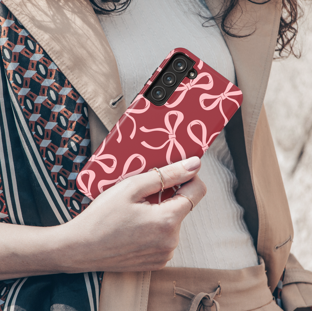 Red Samsung Galaxy case with large pink bow pattern – bold coquette aesthetic phone cover for women, glossy and protective