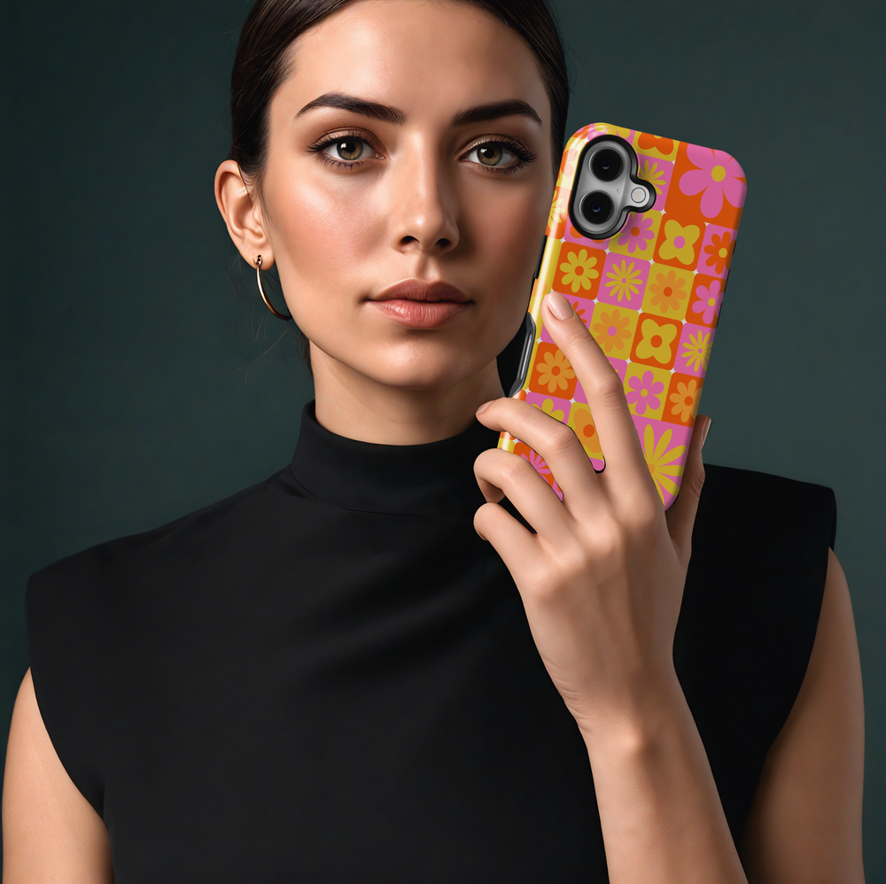 Retro orange pink and yellow floral iPhone 16 case for women – MagSafe compatible, girly flower grid phone case, vibrant glossy iPhone cover
