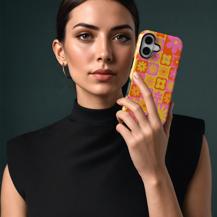 Retro orange pink and yellow floral iPhone 16 case for women – MagSafe compatible, girly flower grid phone case, vibrant glossy iPhone cover
