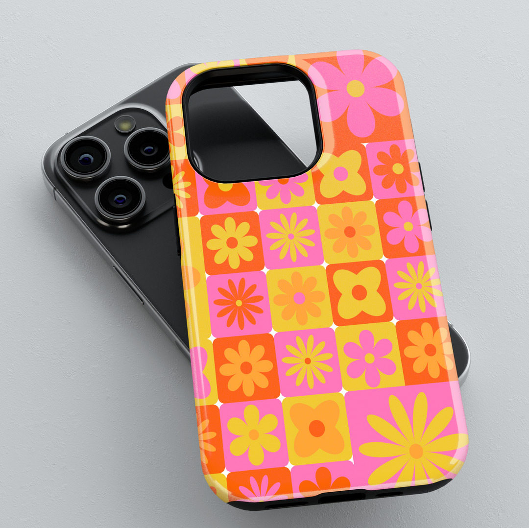 Retro orange pink and yellow floral iPhone 16 case for women – MagSafe compatible, girly flower grid phone case, vibrant glossy iPhone cover