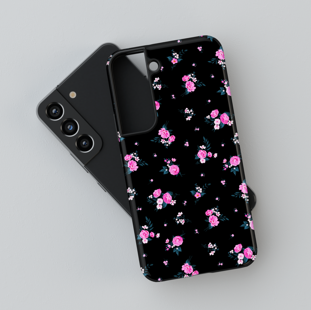 This black floral Galaxy case features tiny pink blossoms scattered across a glossy finish — feminine with a bold twist. Fits Galaxy S24 Ultra, S24 Plus, and S23 FE. Trendy, protective, and pretty.