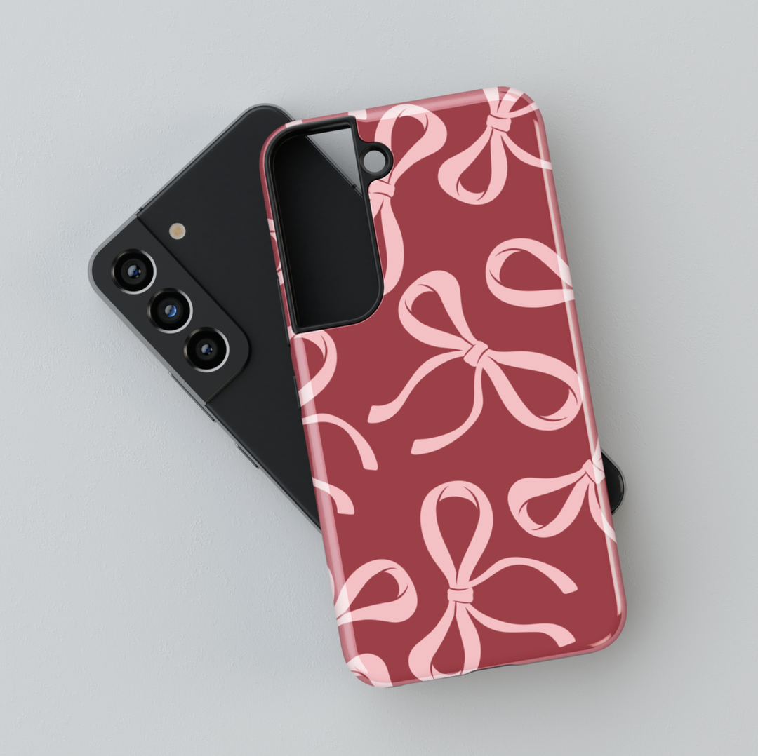 Red Samsung Galaxy case with large pink bow pattern – bold coquette aesthetic phone cover for women, glossy and protective