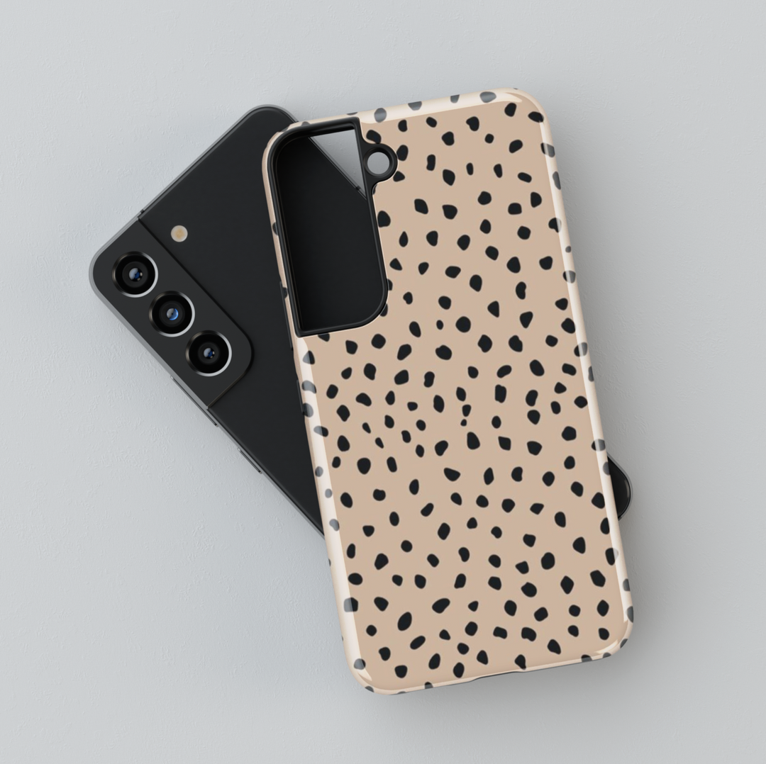 Beige Samsung Galaxy case with minimalist black speckle pattern – trendy neutral aesthetic phone cover for women