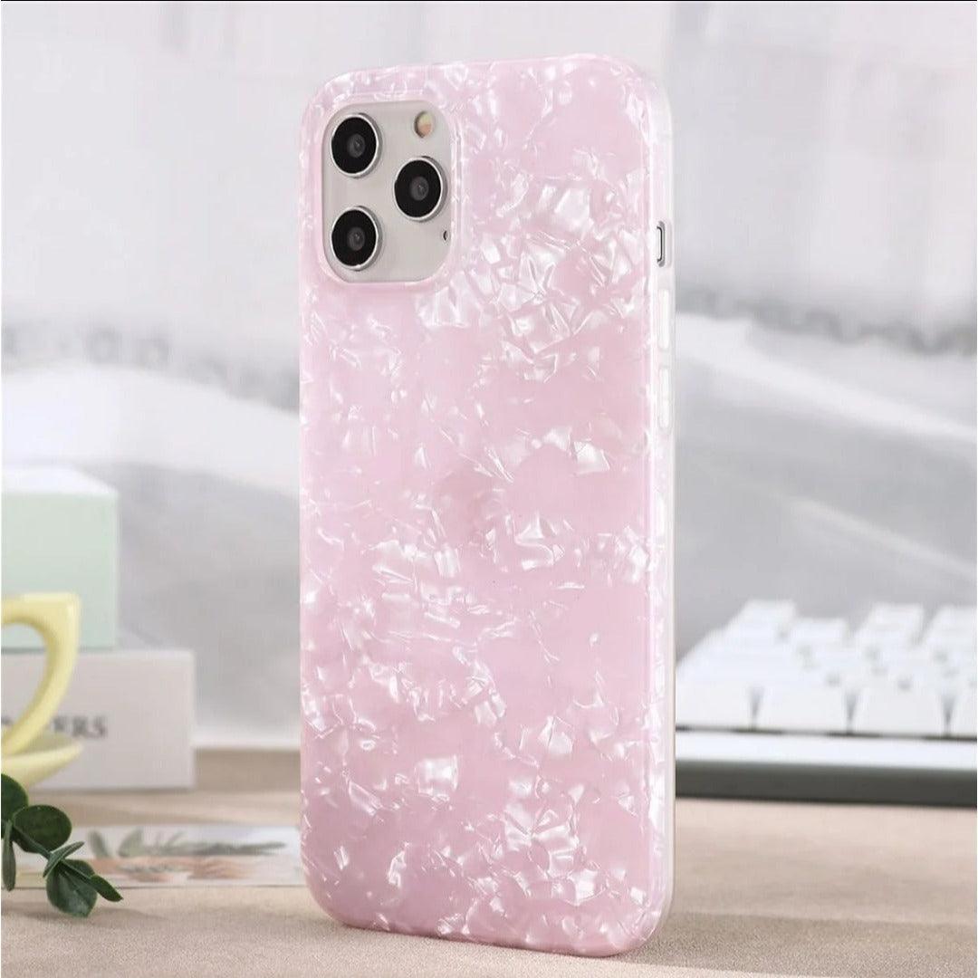 Glossy pearl pink iPhone case with a luxurious shimmer shell texture, designed for a stylish and protective fit.