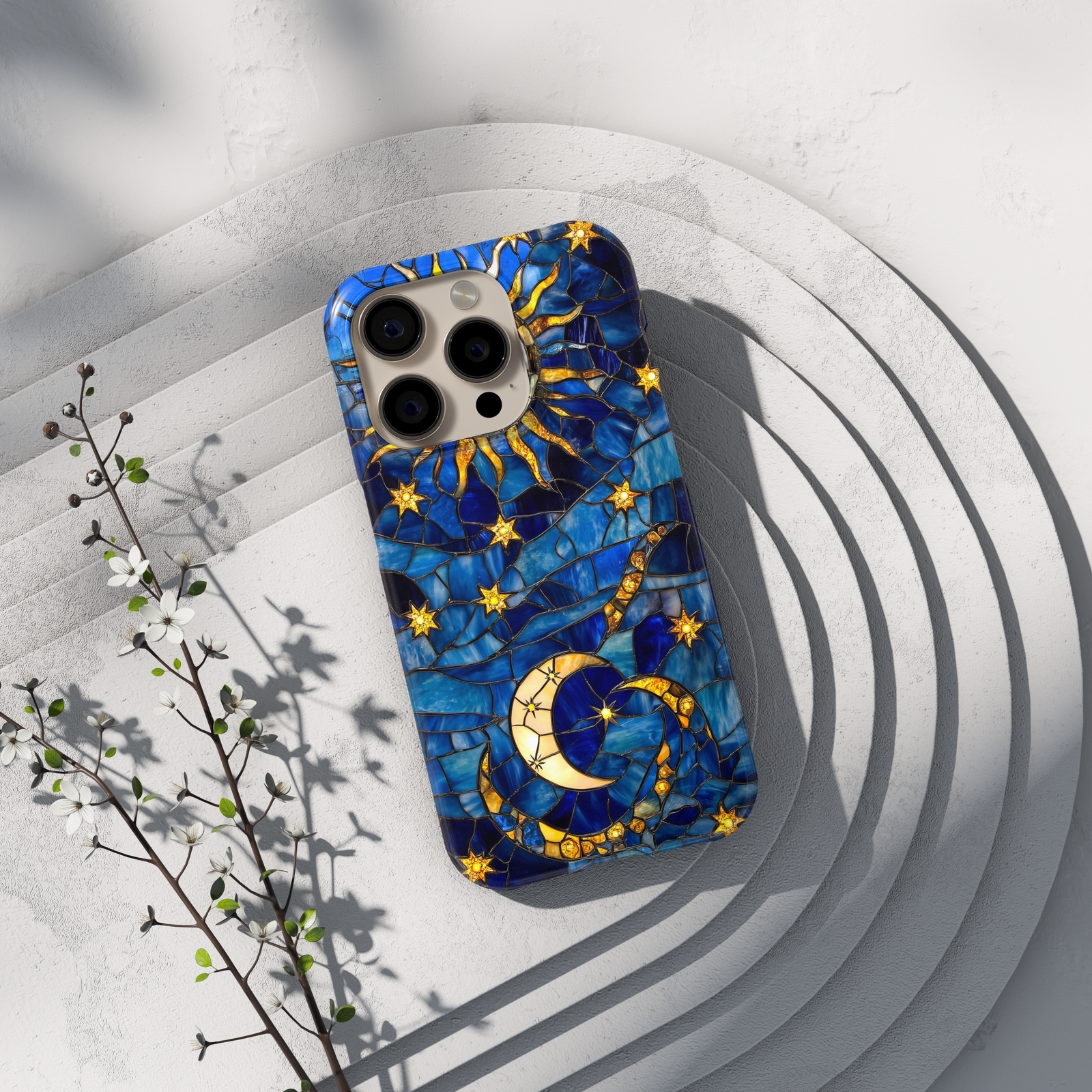 Blue stained glass phone case featuring a golden crescent moon, sun rays, and glowing stars