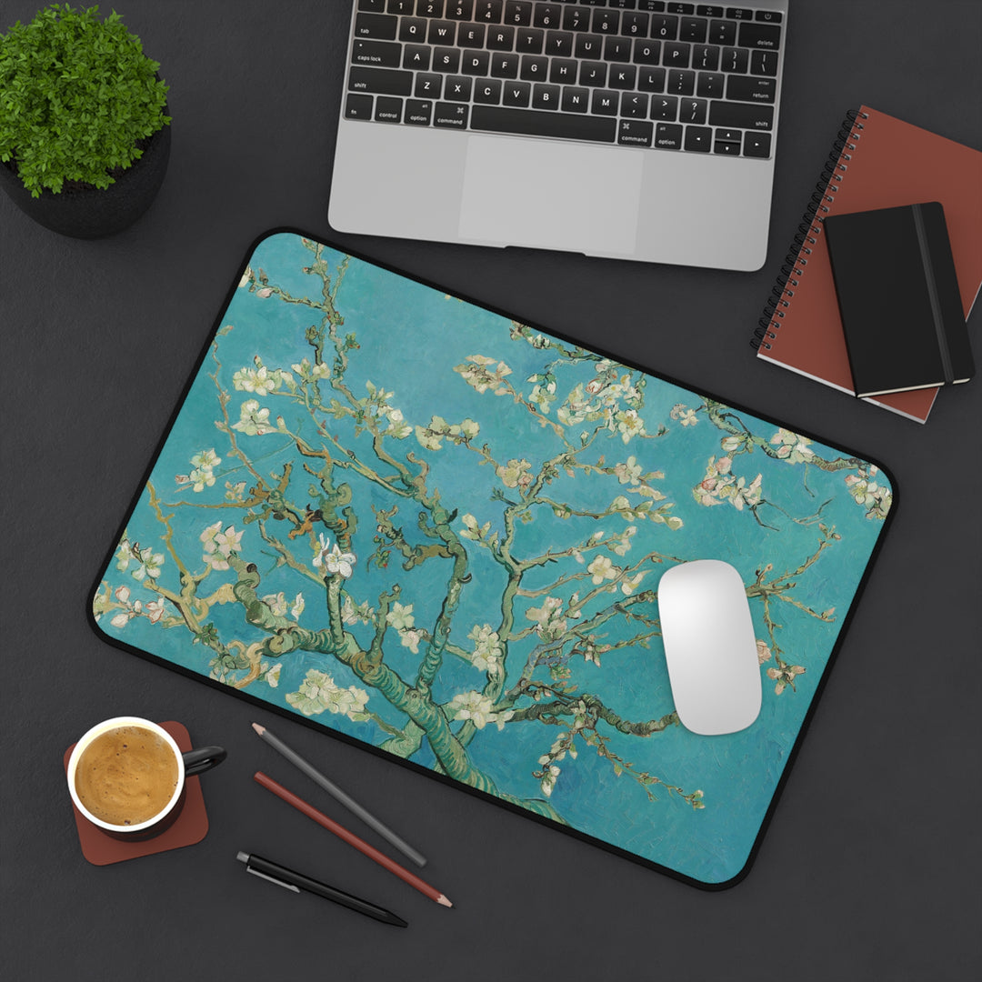 Vincent van Gogh Almond Blossom painting mouse pad and desk mat featuring turquoise blue background, white blossoms and flowering tree branches.