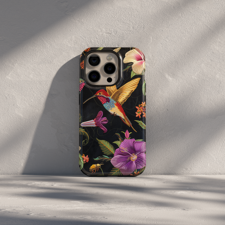Noctyra Bloom dark floral stained glass hummingbird iPhone case on black background