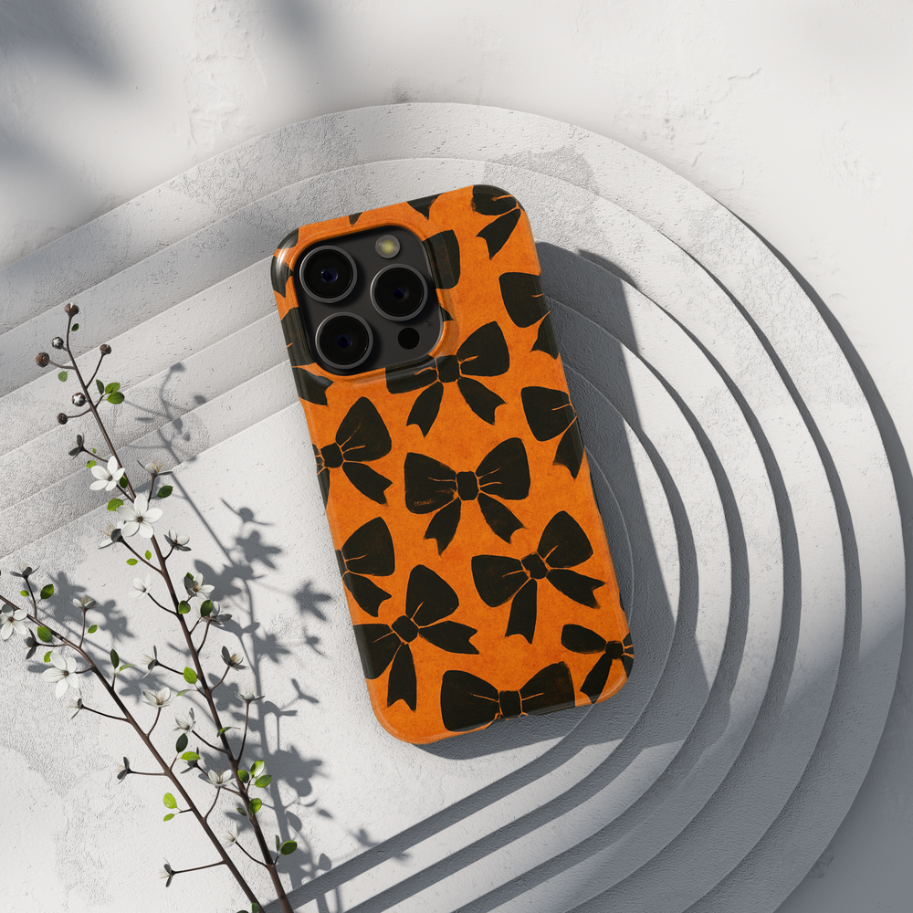 Orange iPhone Case with Black Bow Pattern – MagSafe iPhone 16 Pro Max Case for Women