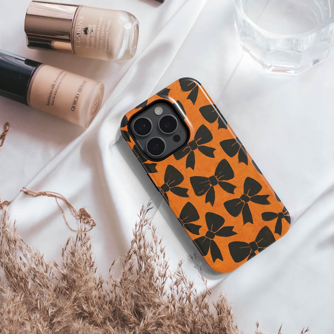 Orange iPhone Case with Black Bow Pattern – MagSafe iPhone 16 Pro Max Case for Women

