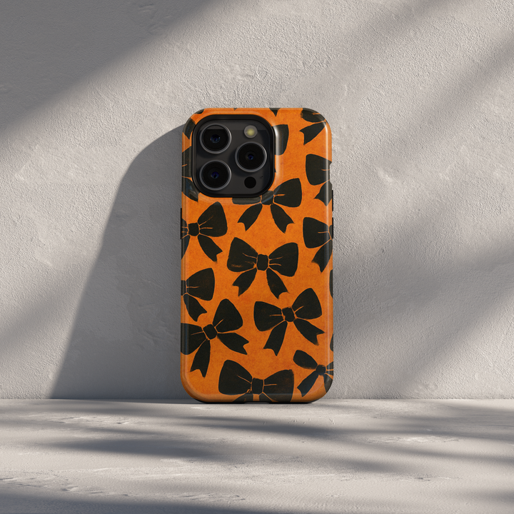 Orange iPhone Case with Black Bow Pattern – MagSafe iPhone 16 Pro Max Case for Women

