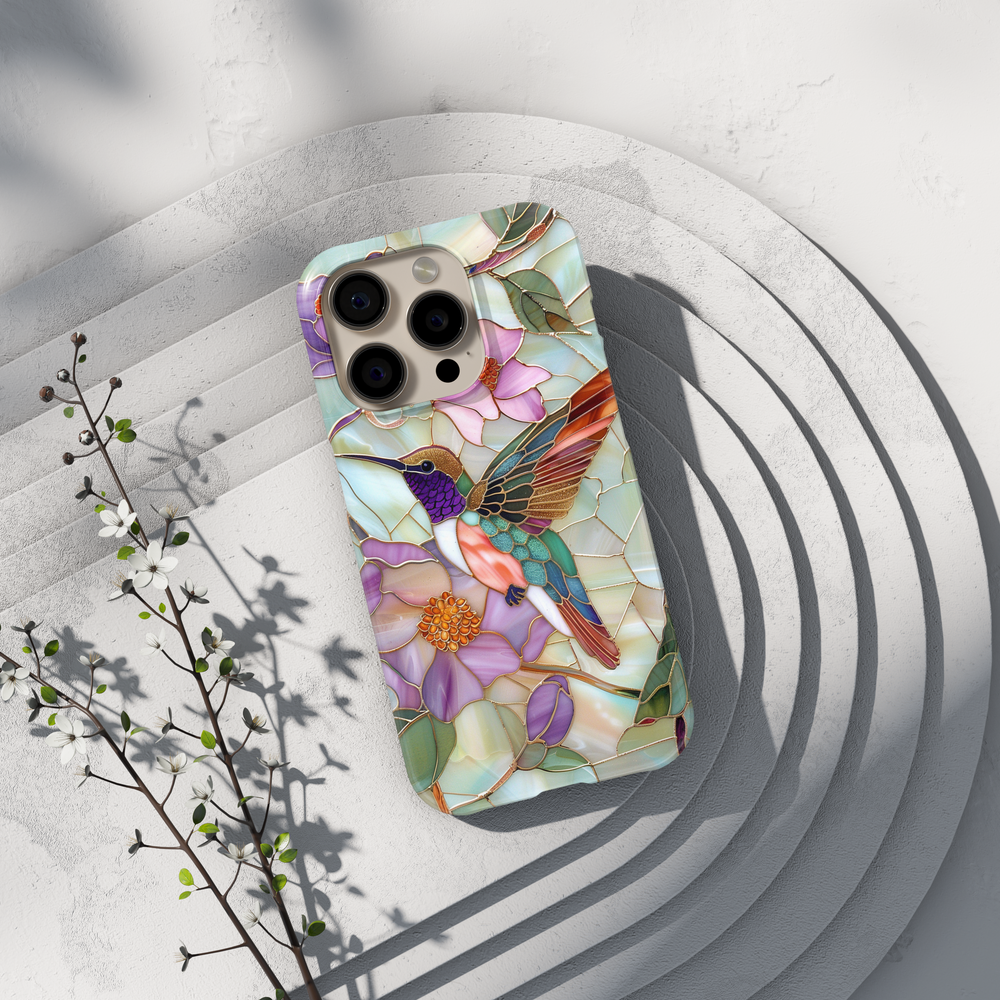 Stained glass hummingbird iPhone case with pastel flowers and mosaic background