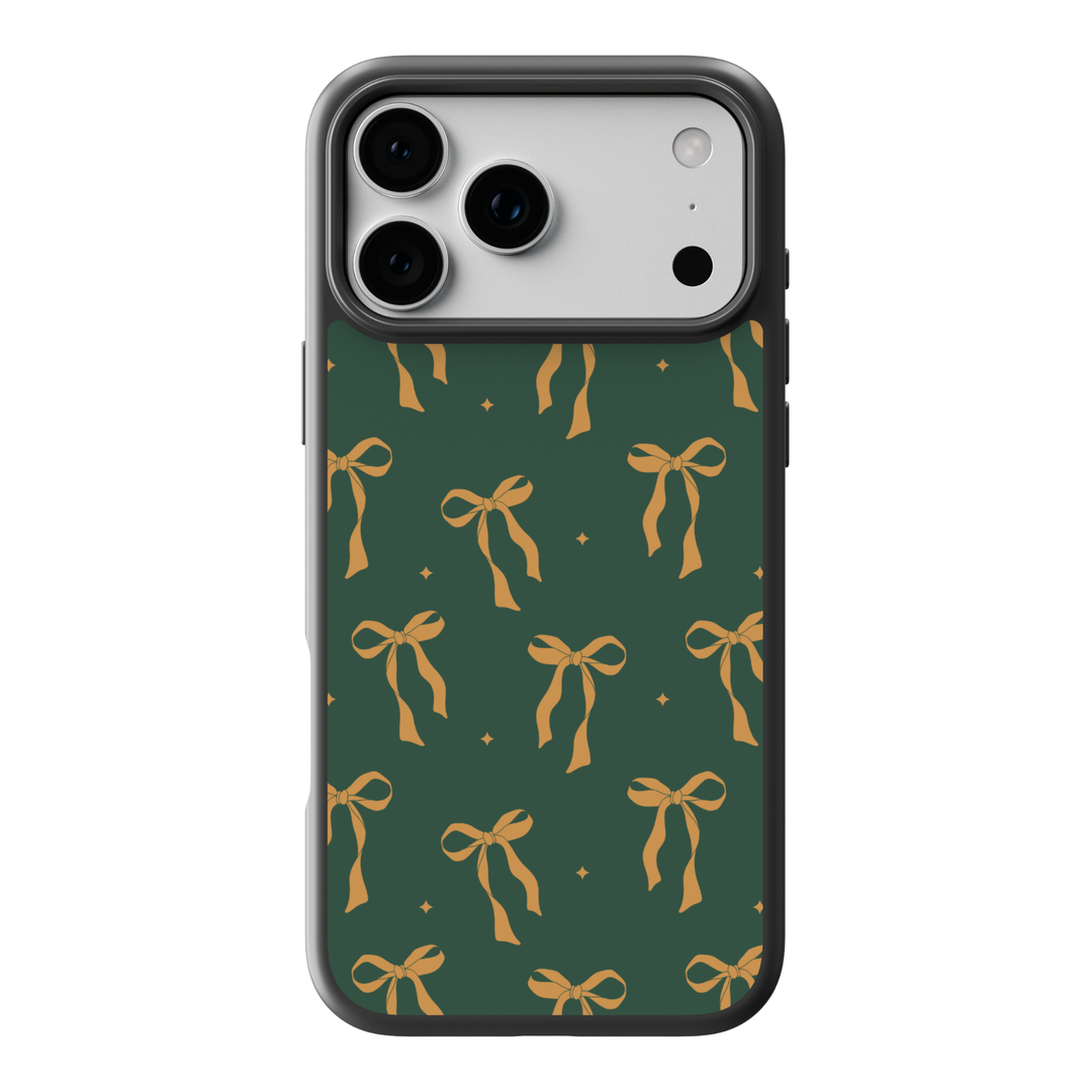 Green phone case with repeating gold bow pattern and small star accents, aesthetic girly ribbon design