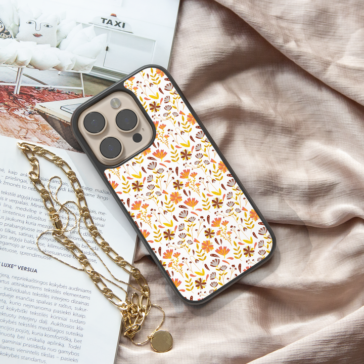 Fall floral iPhone case with autumn flowers pattern in orange, yellow, and brown colors – cute and aesthetic protective cover for iPhone models.